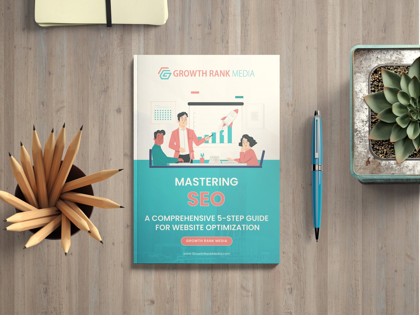 A book titled Mastering SEO: A Comprehensive 5-Step Guide for Website Optimization by Growth Rank Media is on a wooden desk with a potted succulent, a blue pen, a pencil holder, and a closed notebook.